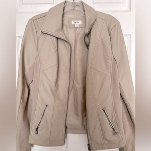Small women’s tan faux leather jacket with cloth side detailing
